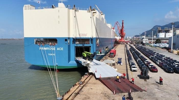 Ro-Ro car carrier loading vehicles at a Chinese port